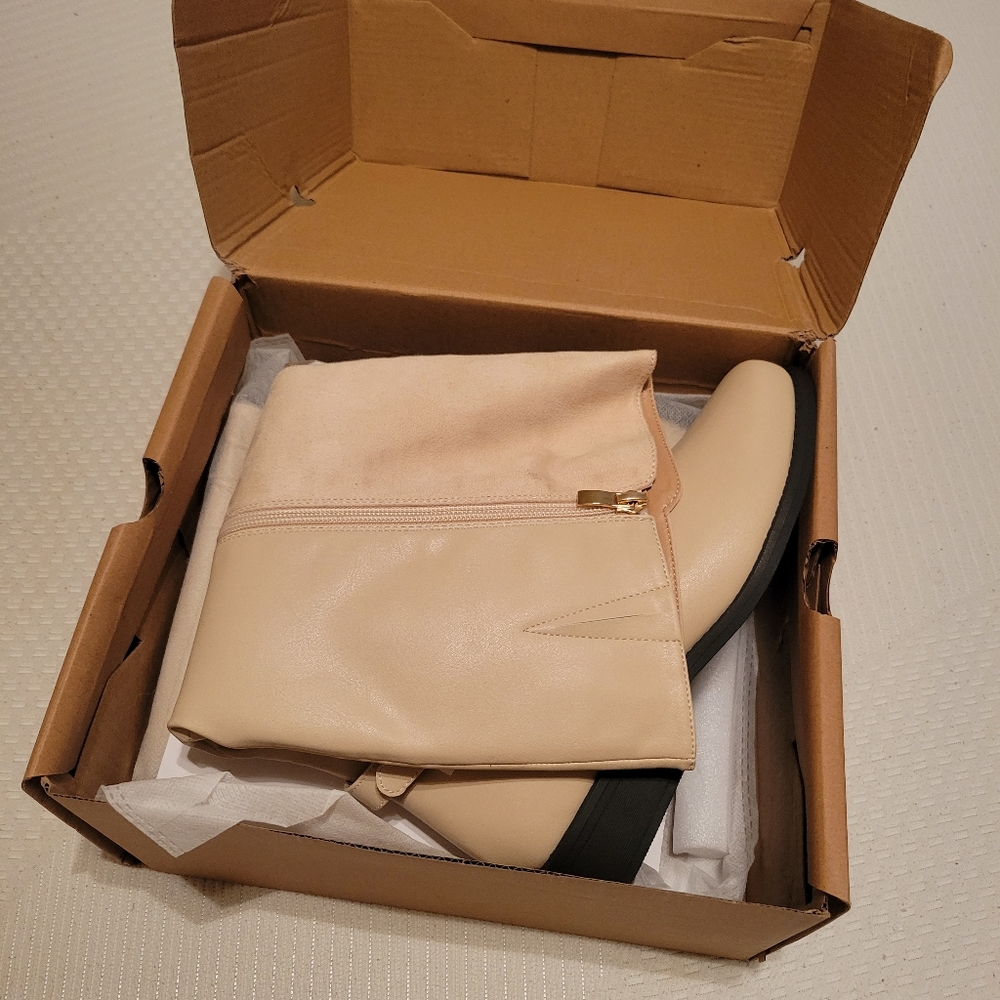 Cream knee high boots